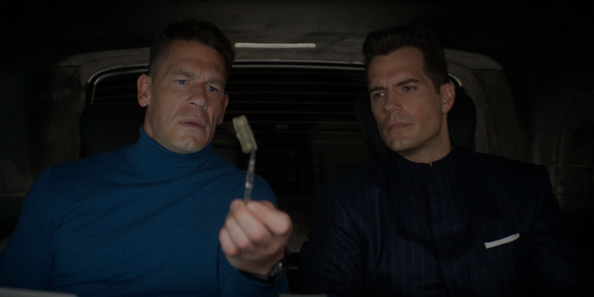 Wyatt and Agent Argylle sit in a car together on a mission in Argylle