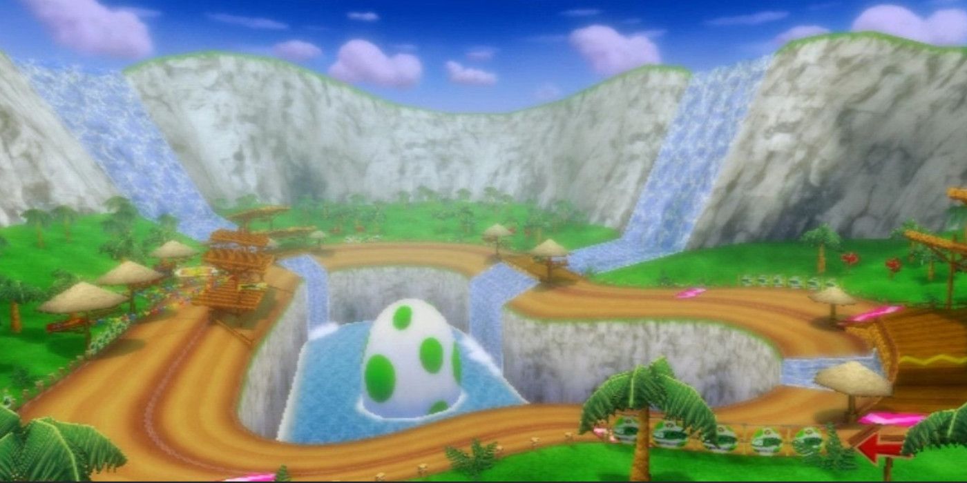 Pista de Mario Kart de Yoshi Falls.  Com um grande ovo de Yoshi no meio de um lago com três cachoeiras.