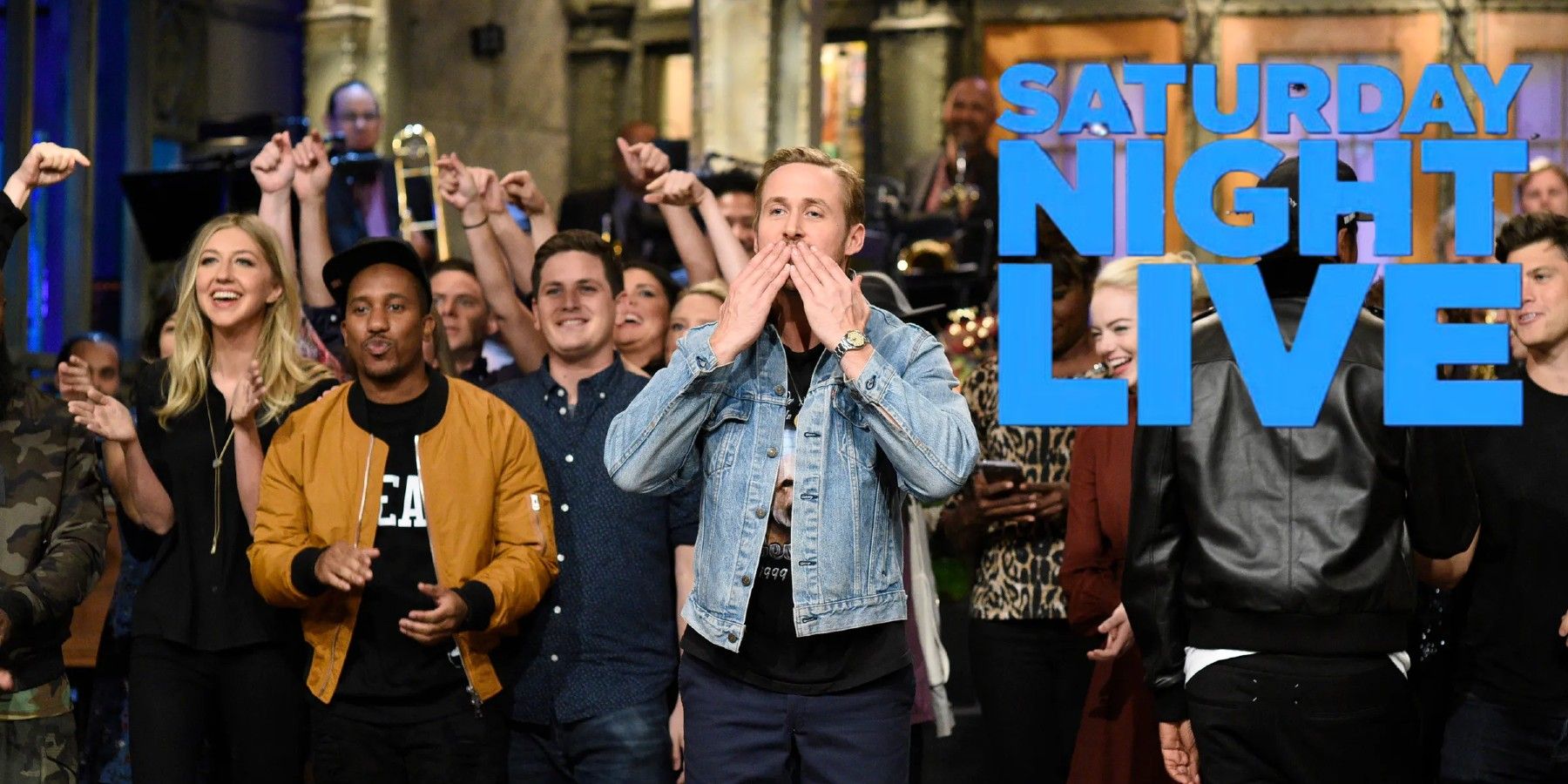 Ryan Gosling and the cast of Saturday Night Live on stage at the end of the show