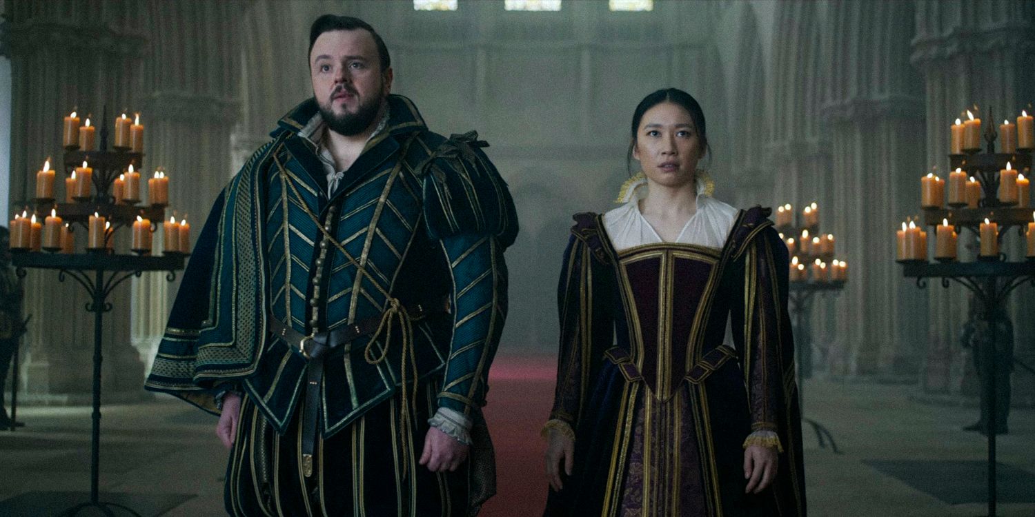 Jin Cheng and Jack Rooney dressed in ancient attire inside a church in 3 body problem