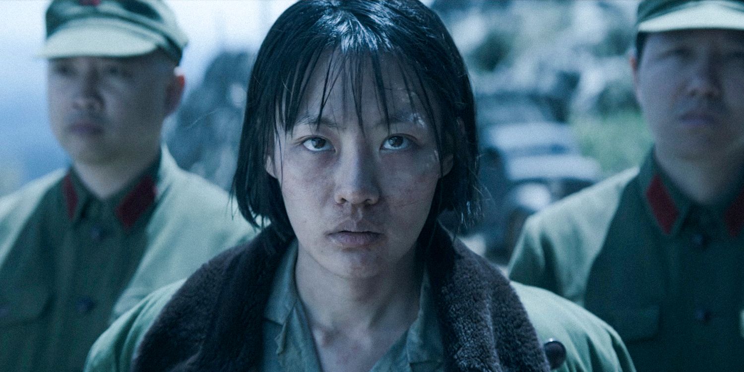 Young Ye Wenjie with a beaten up face and some soldiers behind her in 3 Body Problem