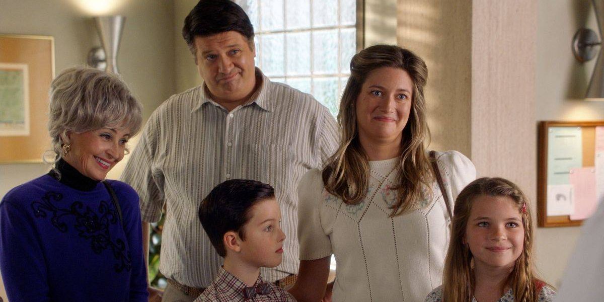 The Cooper family gathered together in Young Sheldon