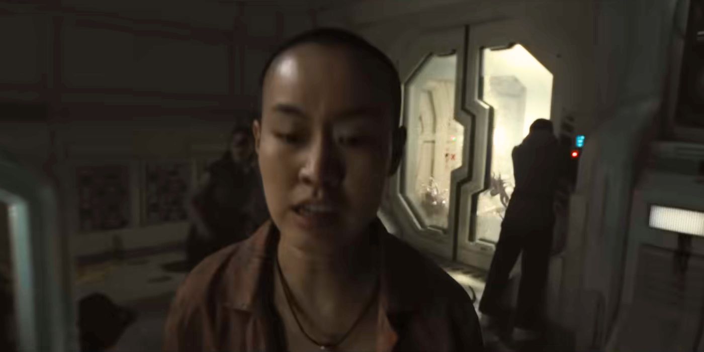 Aileen Wu looks frightened in a scene from Alien Romulus.