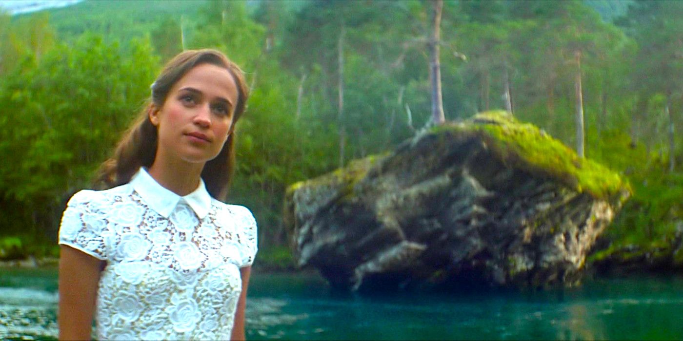 Alicia Vikander wears an enigmatic smile in a scene from Ex Machina