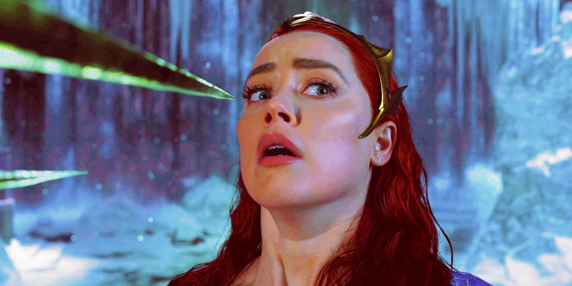 Amber Heard As Mera Being Threatened With A Spear In Aquaman and the Lost Kingdom
