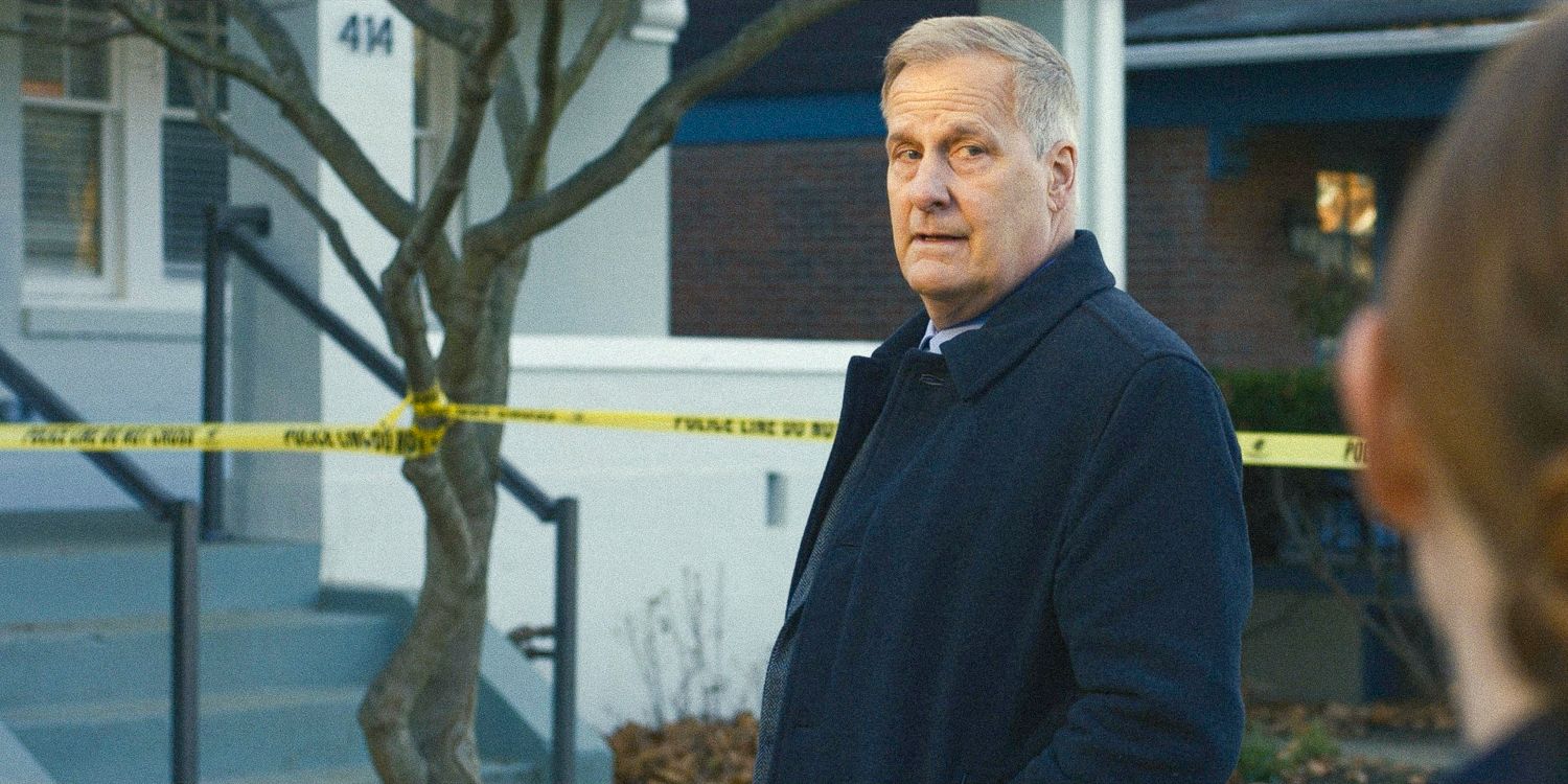  Jeff Daniels as Del Harris standing in front of police tape in American Rust season 2 ep 1