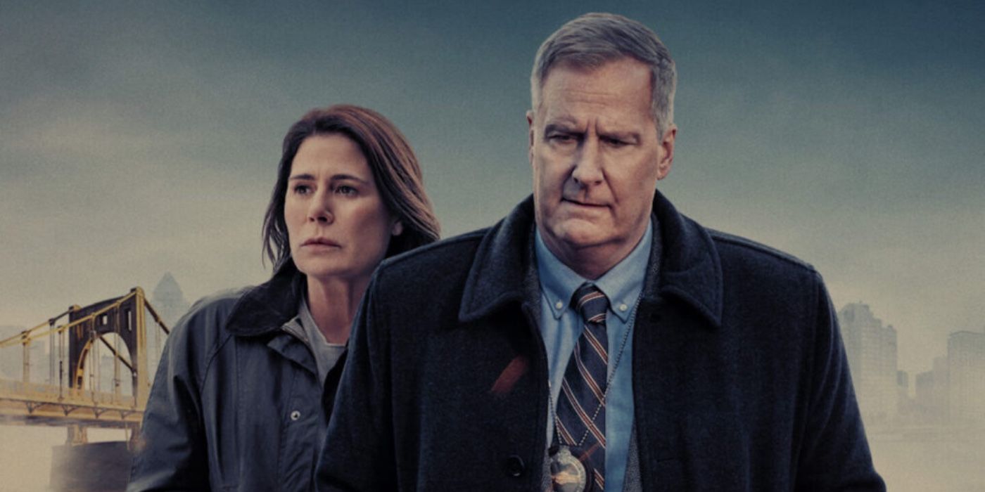 Maura Tierney and Jeff Daniels walk against a grey sky in a promo image for American Rust 