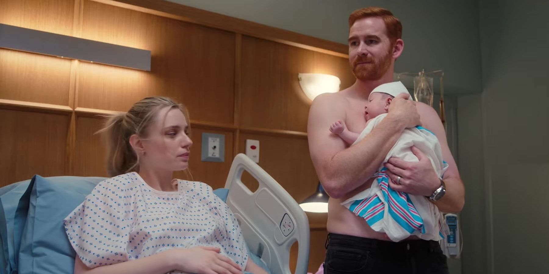 Susan (Anja Savcic) and JT (Andrew Santino) in a hospital room with their baby in Ricky Stanicky