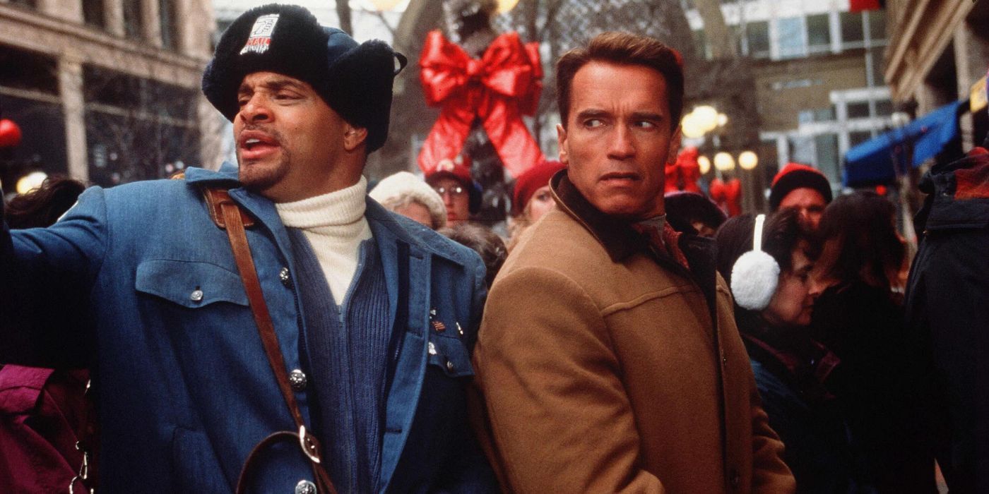 Arnold Schwarzenegger como Howard Langston e Sinbad como Myron Larabee em Jingle All the Way.