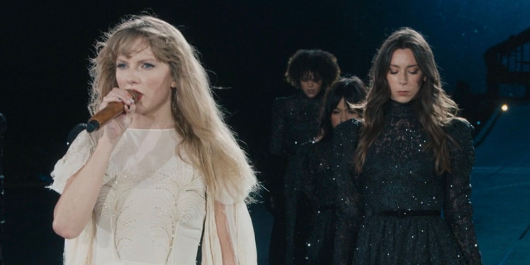 Taylor Swift performs "my rears ricochet" with backup dancer Audrey Douglass in The Eras Tour movie.