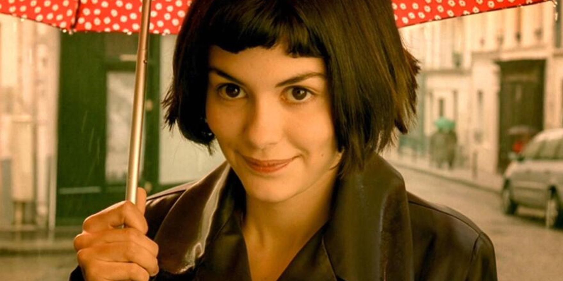 Audrey Tautou com guarda-chuva em Amelie