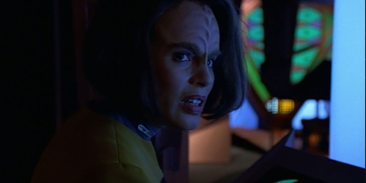 b'elanna torres in dim blue light aboard dreadnought voyager