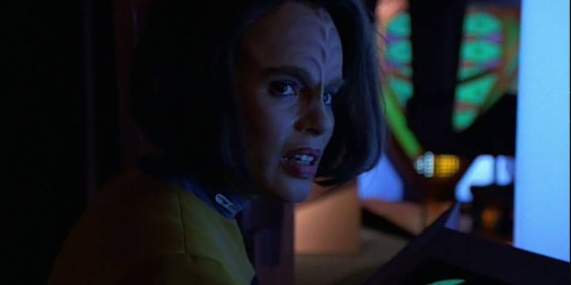 b'elanna torres in dim blue light aboard dreadnought voyager
