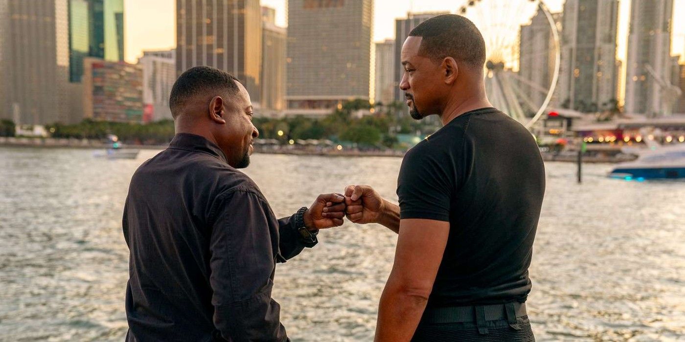 Marcus (Martin Lawrence) and Mike (Will Smith) bumping fists in Bad Boys Ride or Die