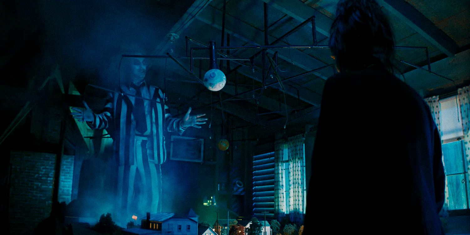 Beetlejuice making his appearance in the attic in front of Lydia Deetz in Beetlejuice 2