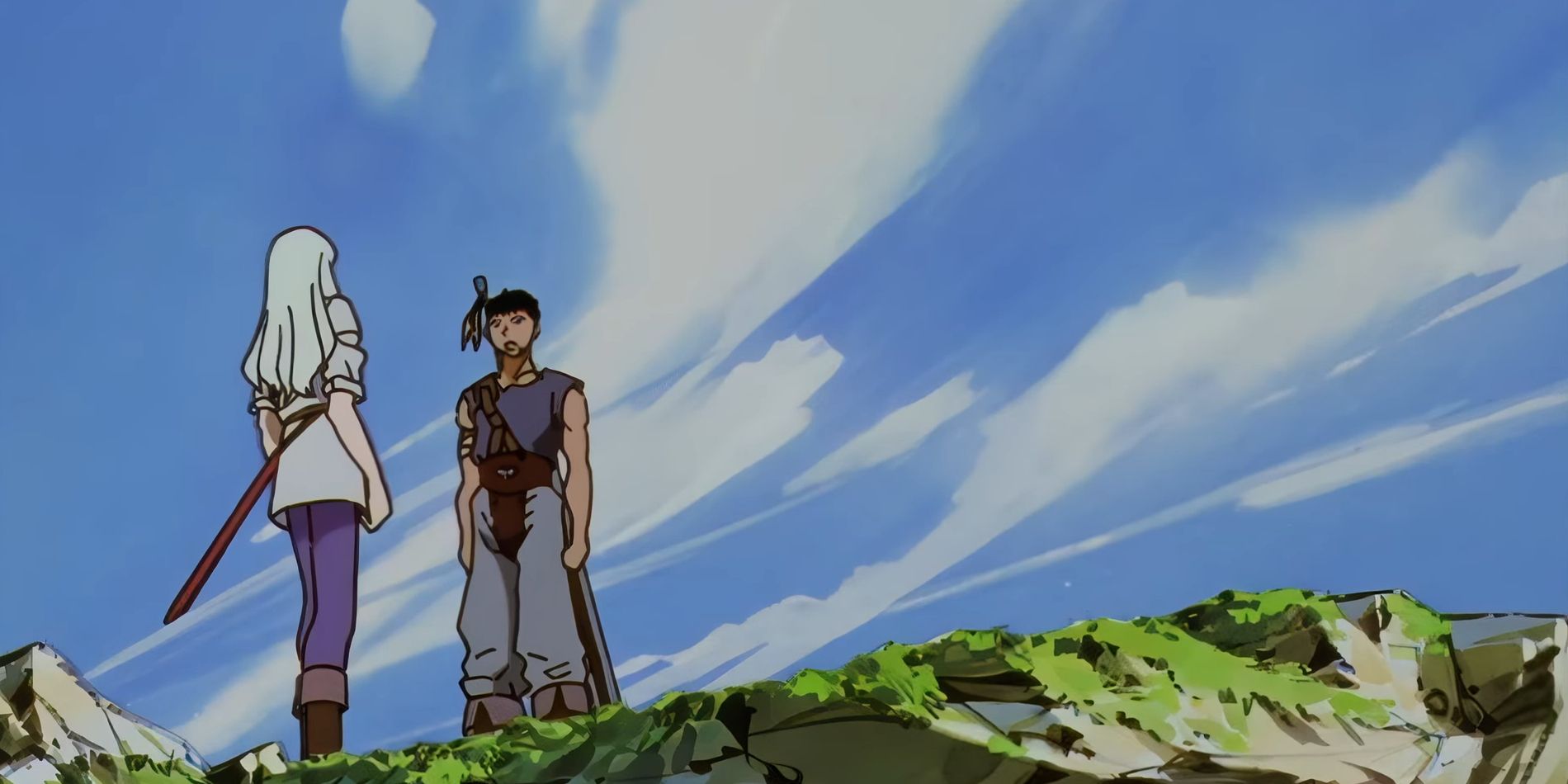 Captura de tela do anime Berserk 1997 mostra um jovem Guts e Griffith conversando em uma encosta com um céu azul brilhante atrás deles.  Eles apresentam detalhes mínimos, como o rosto de Guts desenhado com apenas algumas linhas para criar uma expressão.