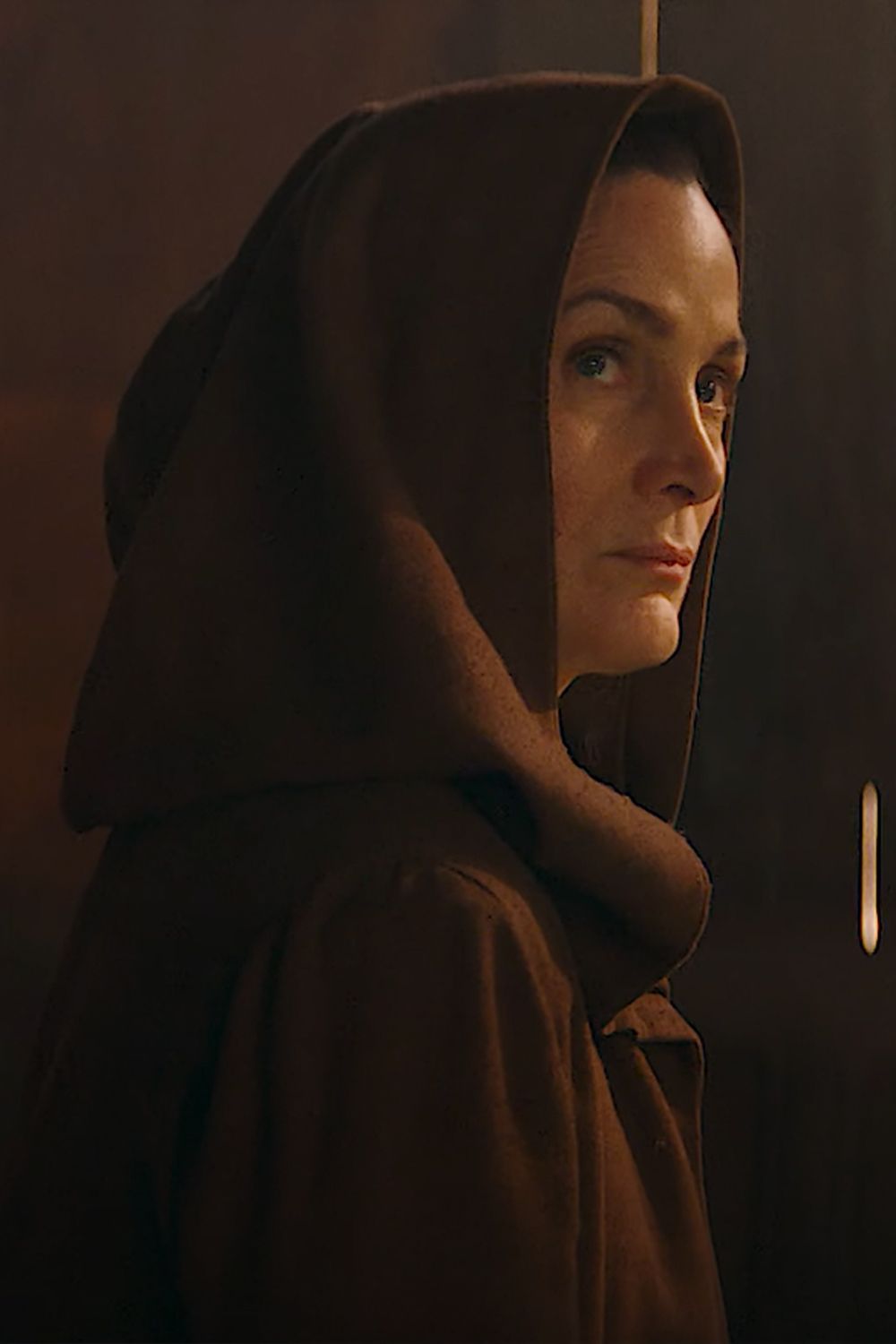 Carrie-Anne Moss as Indara Star Wars The Acolyte Wearing a Jedi Robe with Her Hood Up