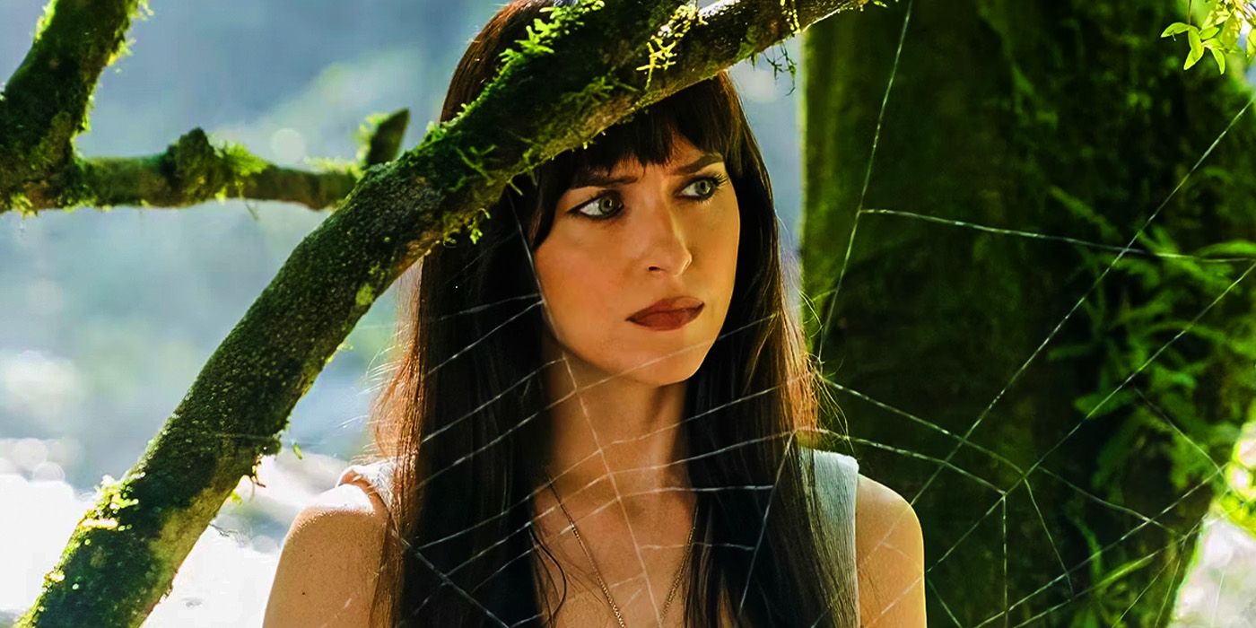 Cassandra Webb in Peru in Madame Web looking concerned behind a spider web