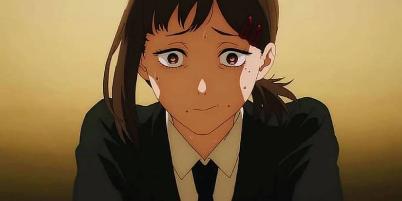 Chainsaw Man's Kobeni looks worried and is sweating.