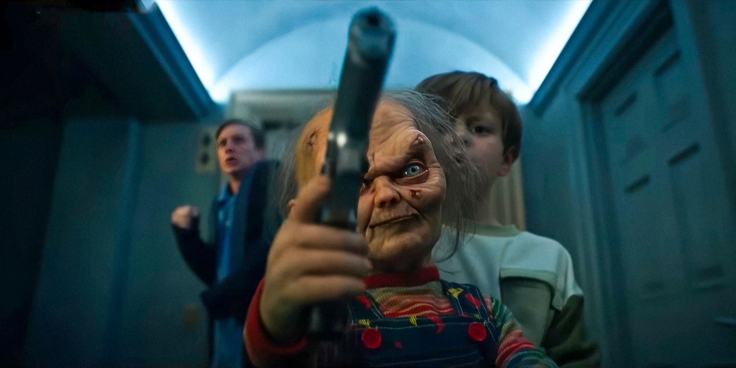 The old Chucky pointing a gun with Henry Collins behind him in Chucky season 3 part 2 trailer
