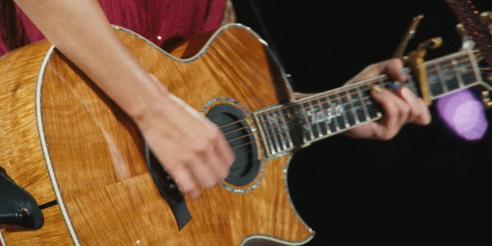 Close up of Taylor Swift's guitar for the acoustic set of the Eras Tour