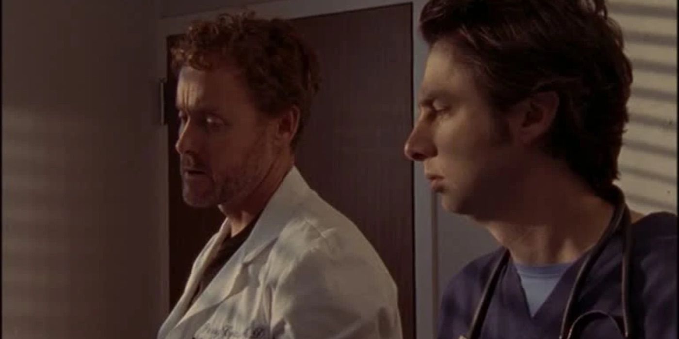 J.D. and Dr. Cox look down and talk sadly in Scrubs