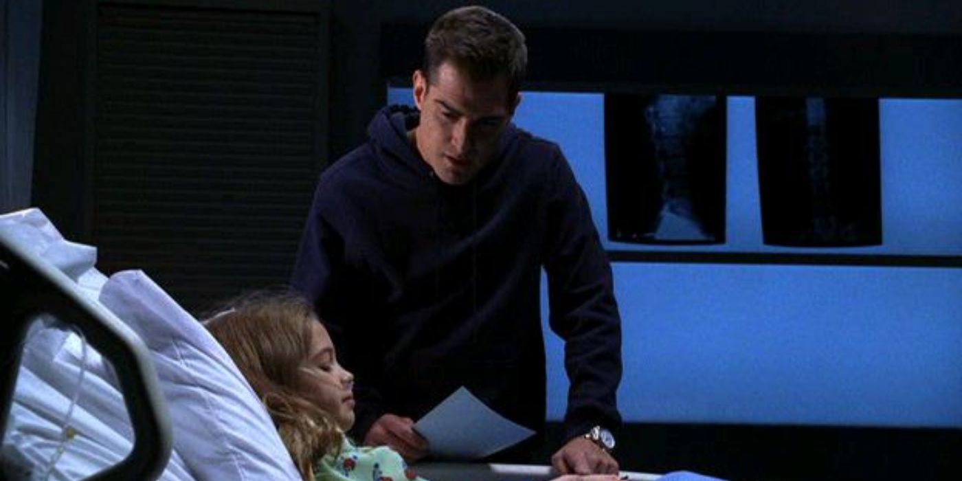 Nick Stokes sitting by Cassie in CSI episode Gum Drops