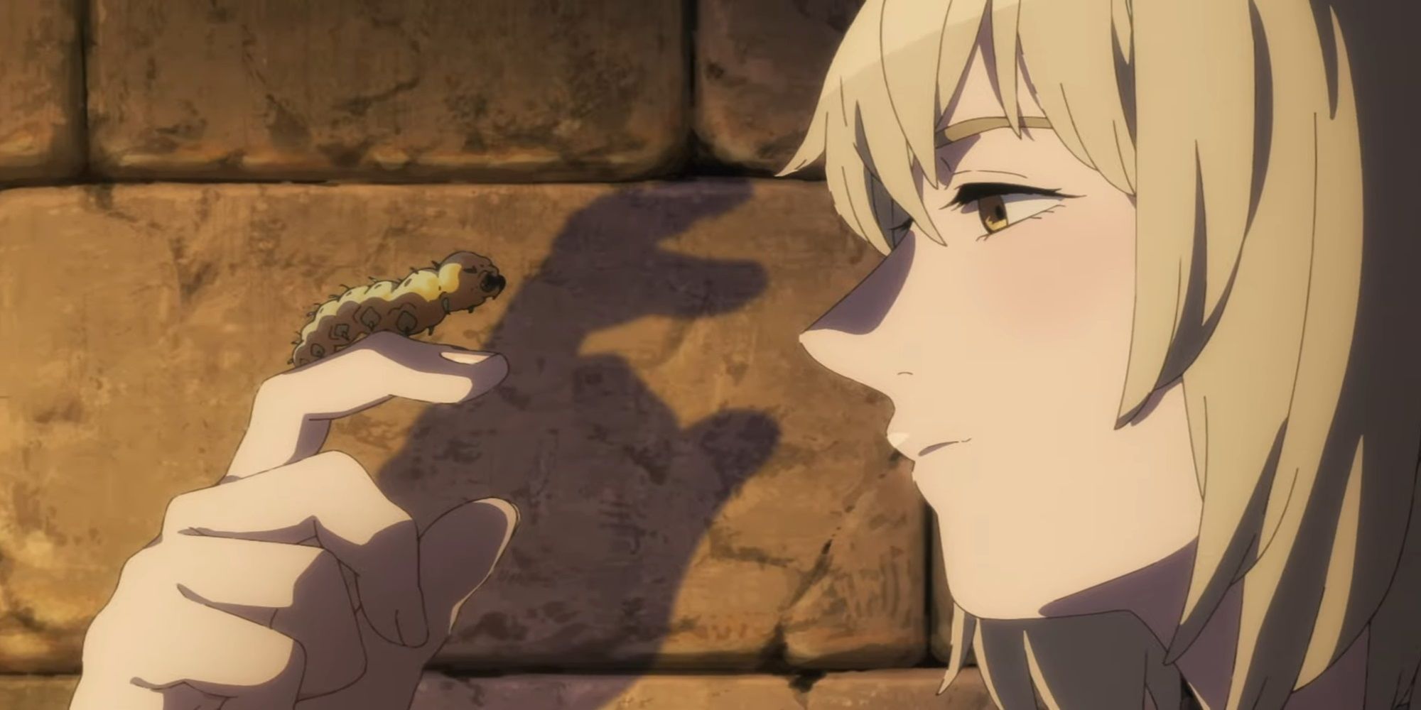 Delicious In Dungeon Trailer screencap of Falin holding a small bug on her hand.