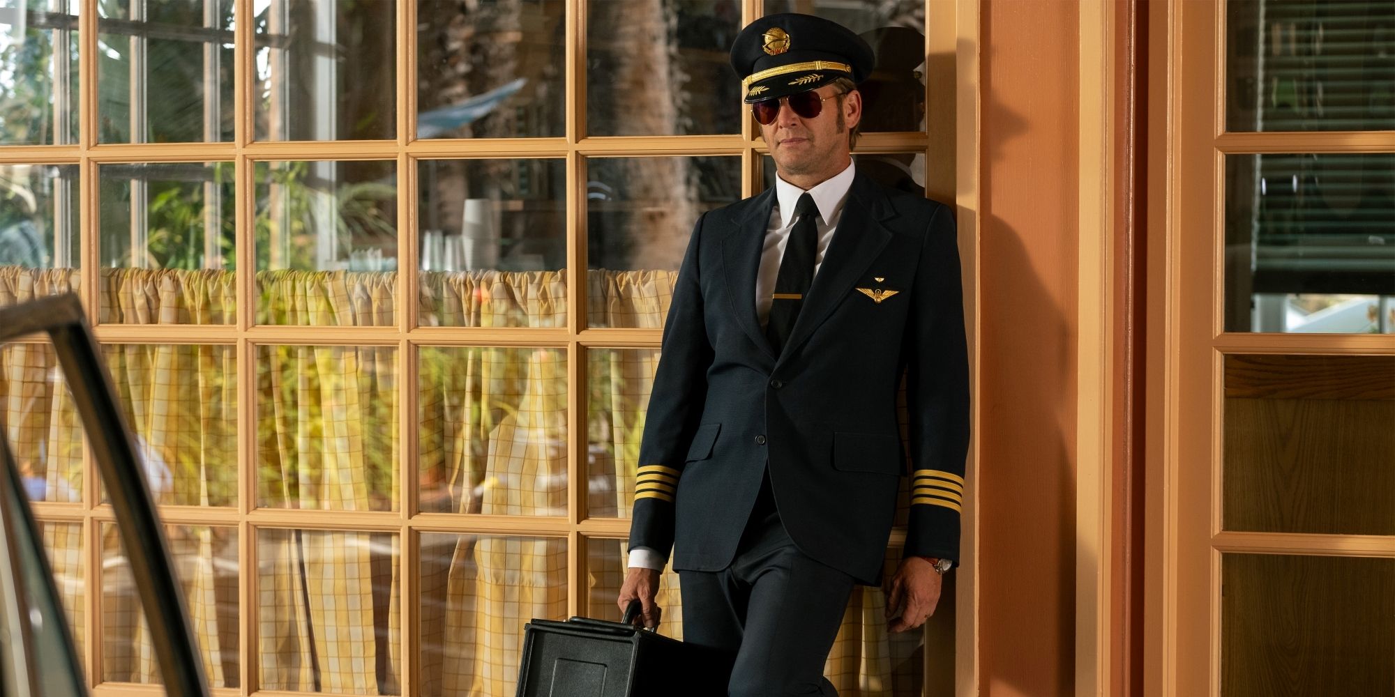 Josh Lucas As Douglas Dougie Dellacorte Simmons In His Pilot Uniform In Palm Royale.jpg