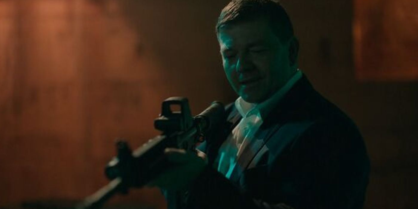 duffy holding a gun in slow horses