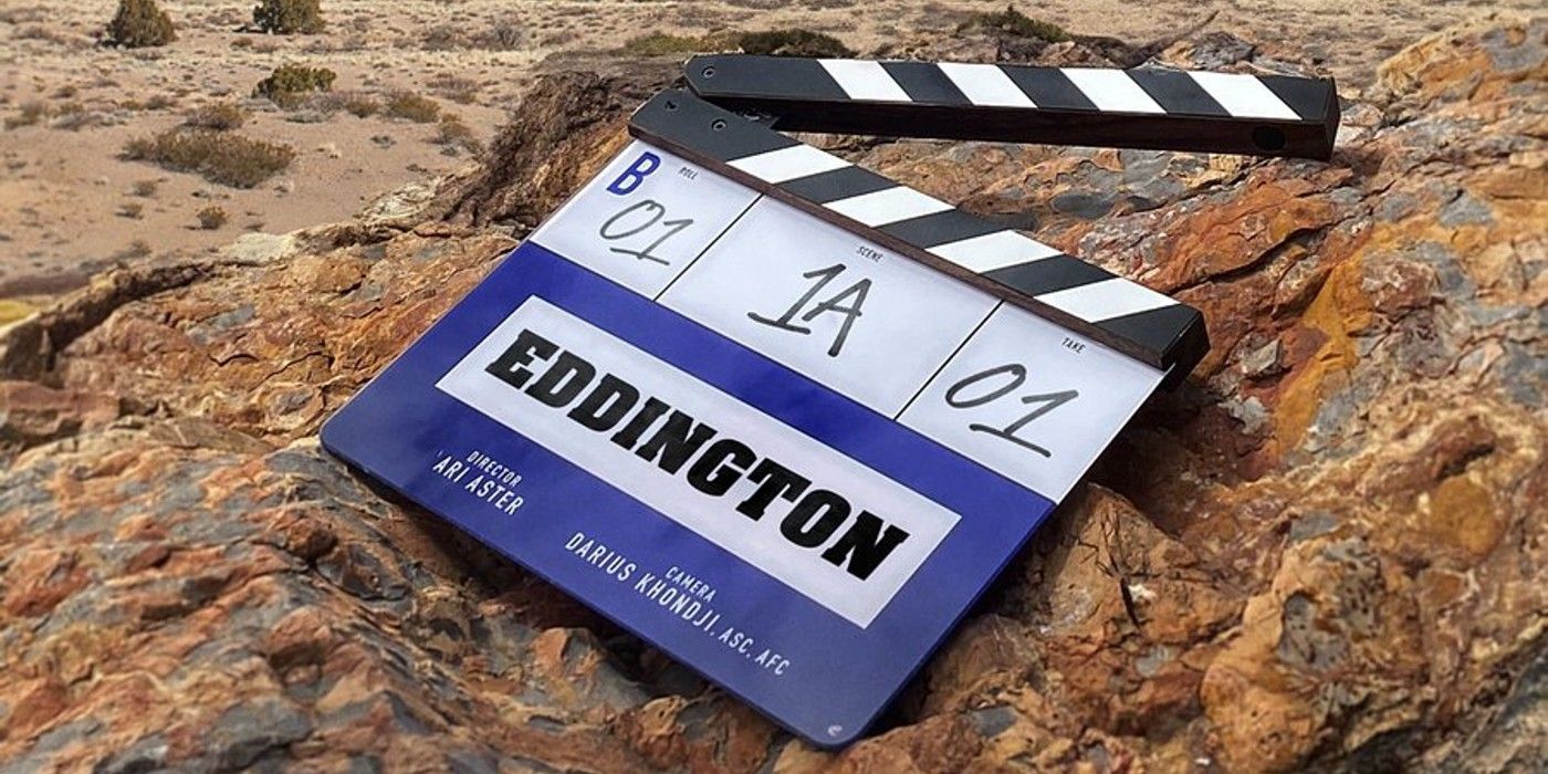 A teaser poster for Ari Aster's Eddington, featuring a clapperboard with some production details on rocky soil