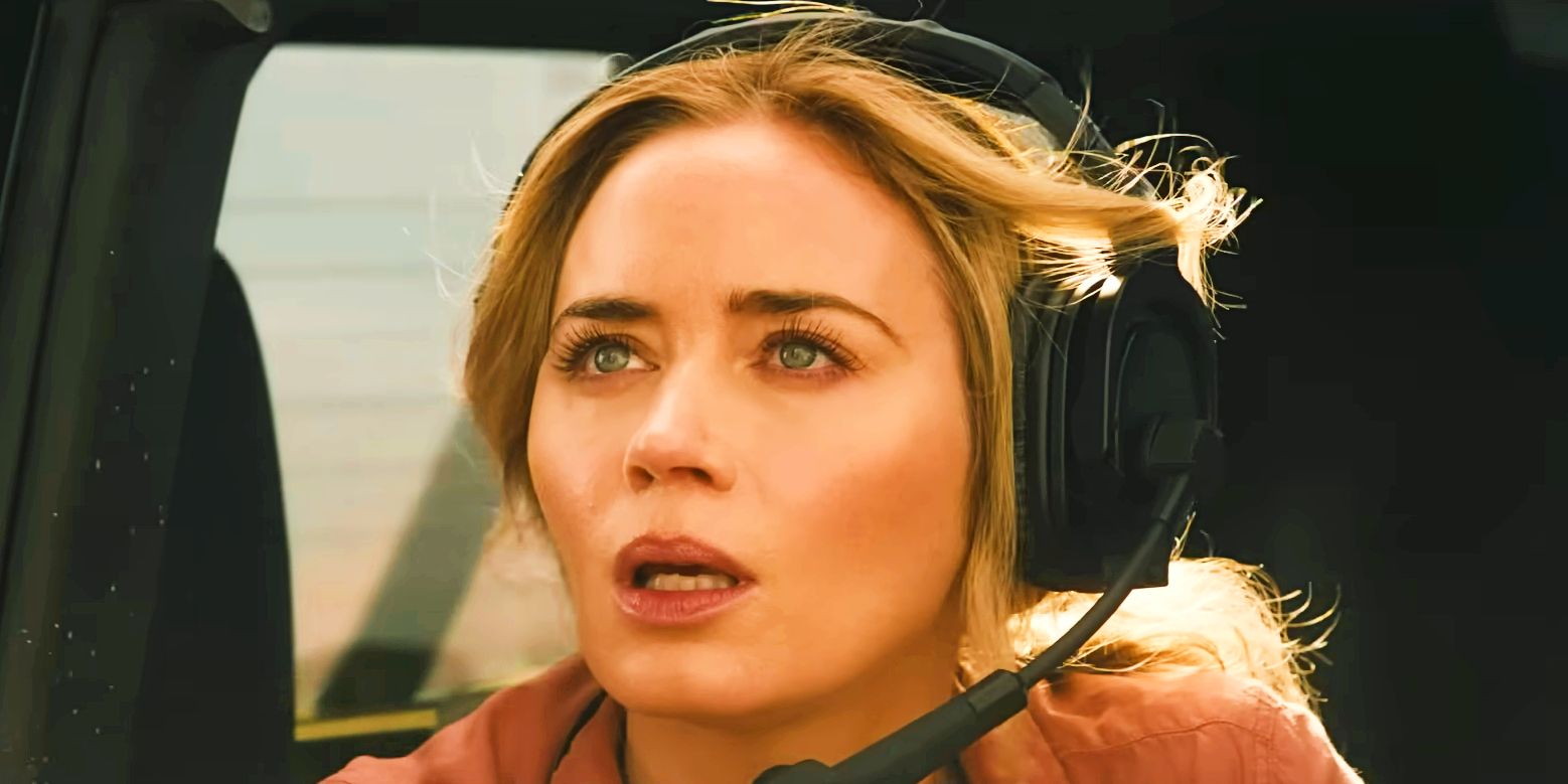 Emily Blunt as Jody wearing a headset and looking up in The Fall Guy