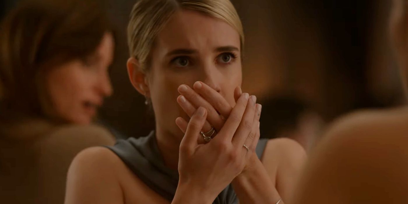 Emma Roberts as Anna Covering Her Mouth in Shock in American Horror Story Delicate