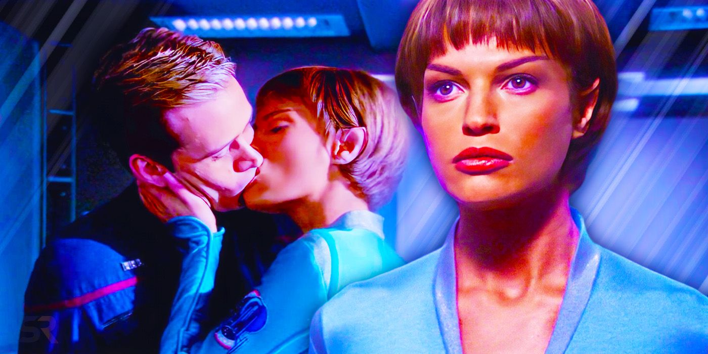 Jolene Blalock's T'Pol looking serious and kissing Connor Trinneer's Trip Tucker on Star Trek: Enterprise