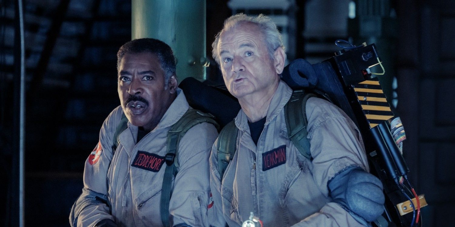 Ernie Hudson and Bill Murray in Ghostbusters suits and carrying proton packs in Ghostbusters Frozen Empire