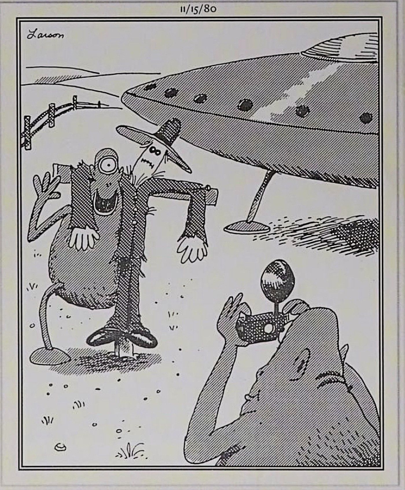Far Side, alien visitors to Earth taking pictures with scarecrow