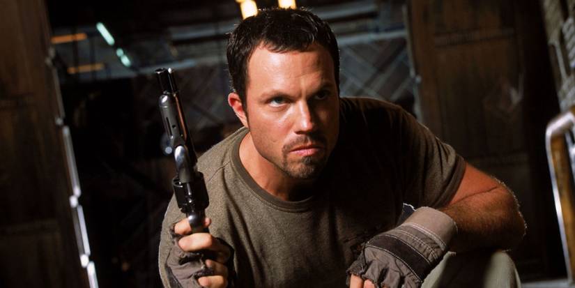 Jayne holding a gun in Firefly