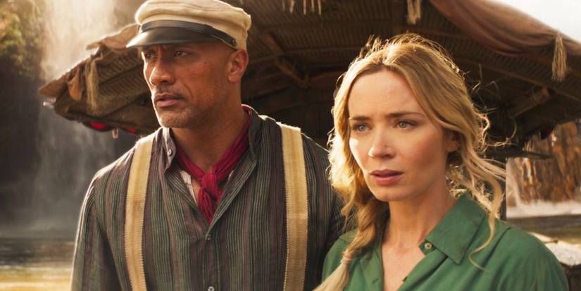 Frank and Lily looking off their boat in Jungle Cruise
