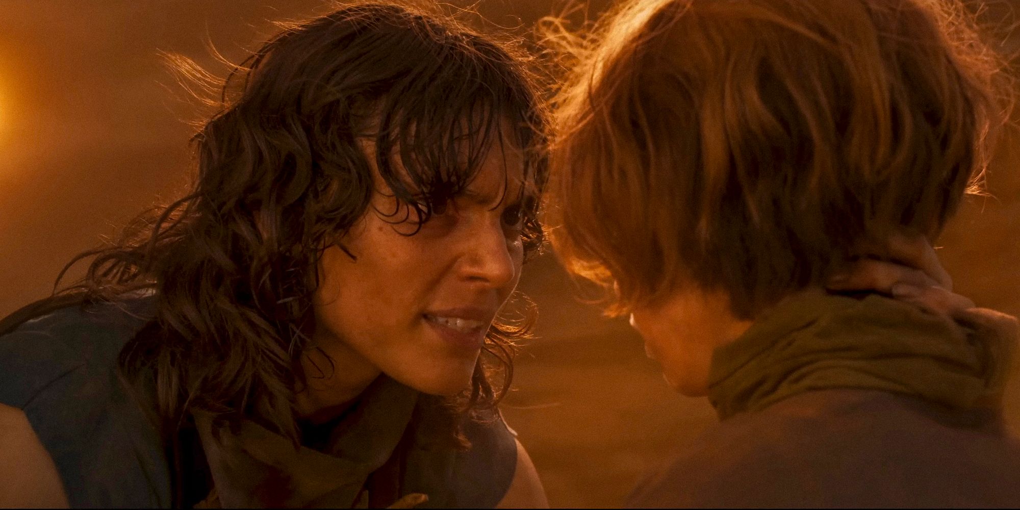 Charlee Fraser and Young Furiosa face to face in Furiosa: A Mad Max Saga