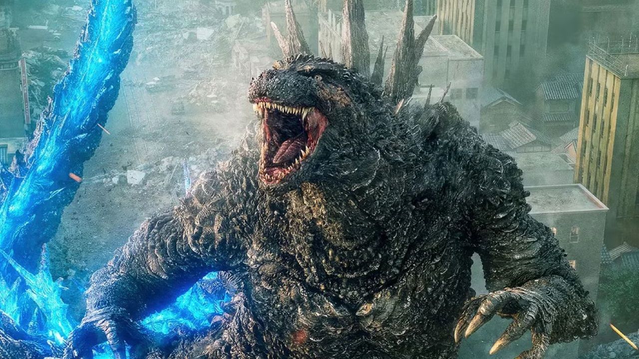 Godzilla parado em uma cidade destruída e rugindo em Godzilla Minus One