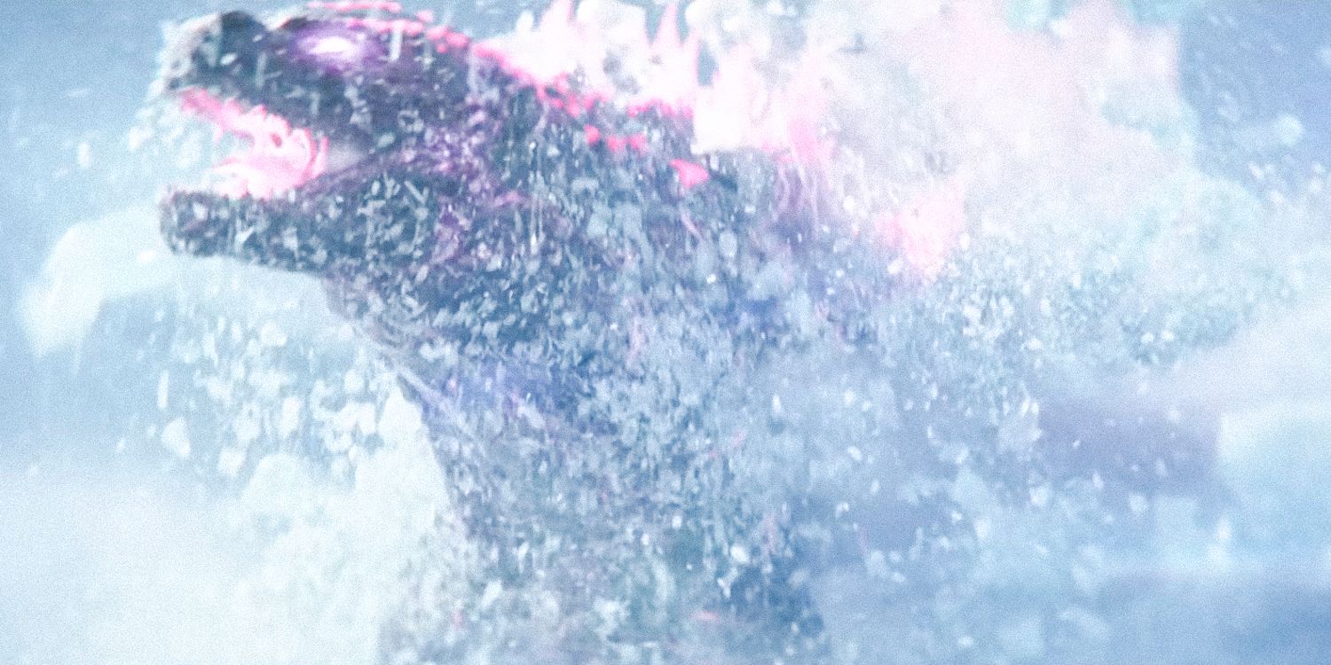 godzilla with glowing eyes and body in red emerging from the ice in Godzilla x Kong: The New Empire