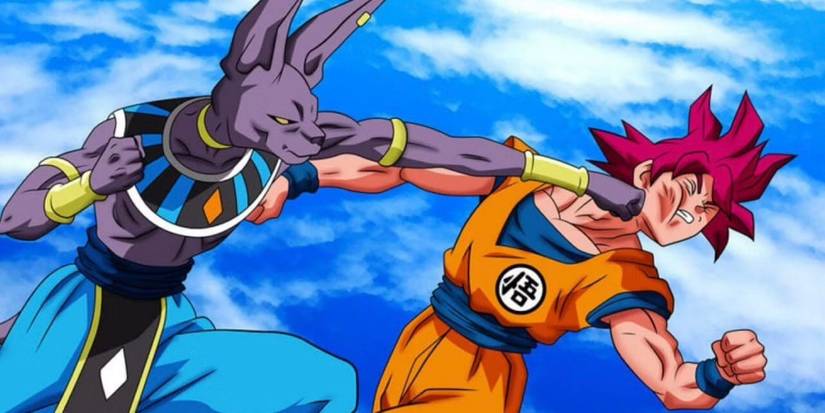 Beerus de Dragon Ball Super frappe Goku God au visage