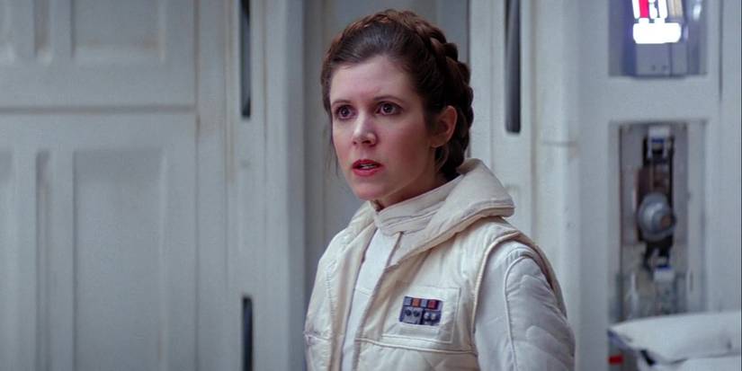 Leia Organa (Carrie Fisher) scowls in her white winter outfit on H๏τh in The Empire Strikes Back