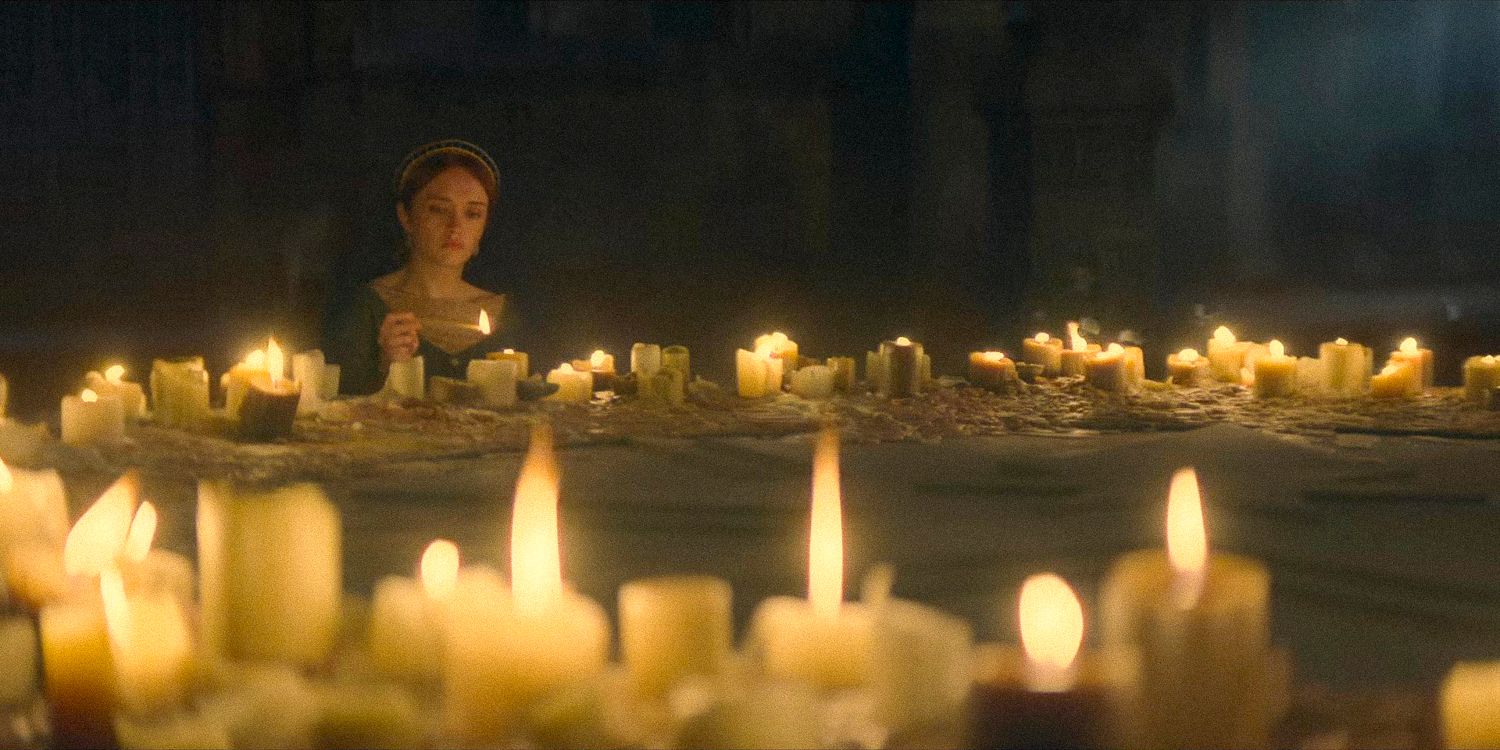 Queen Alicent Hightower lighting many candles in House of the Dragon - season 2