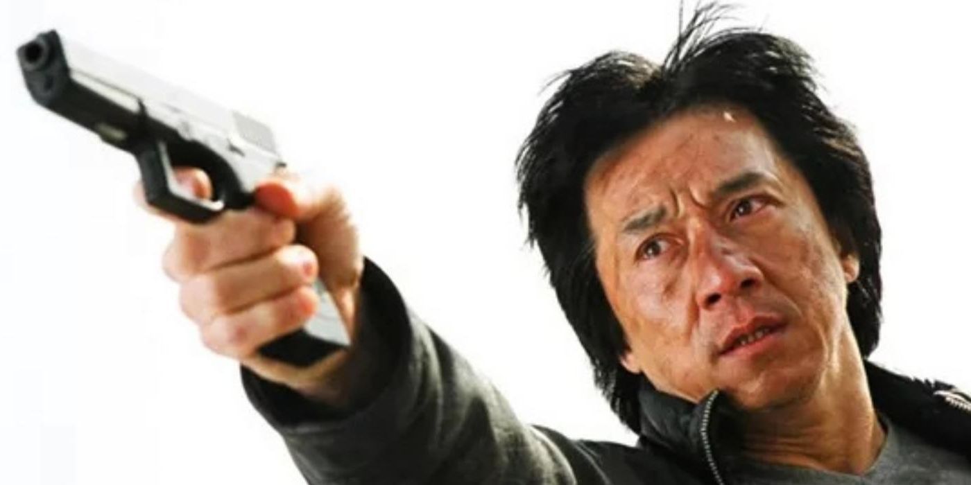 Jackie Chan as Chief Inspector Chan Kwok-wing aims a handgun in New Police Story.