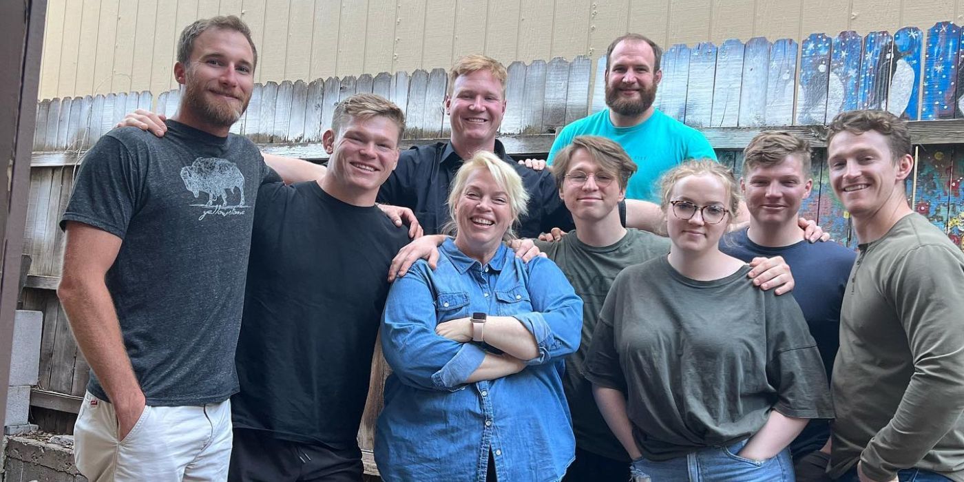 Janelle, Garrison, Paedon Brown of Sister Wives fame in an Instagram Post with eight kids smiling outside, with their arms around each other