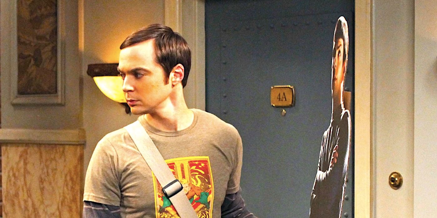 Jim Parsons' Sheldon frowning as he holds a Spock cut out in The Big Bang Theory