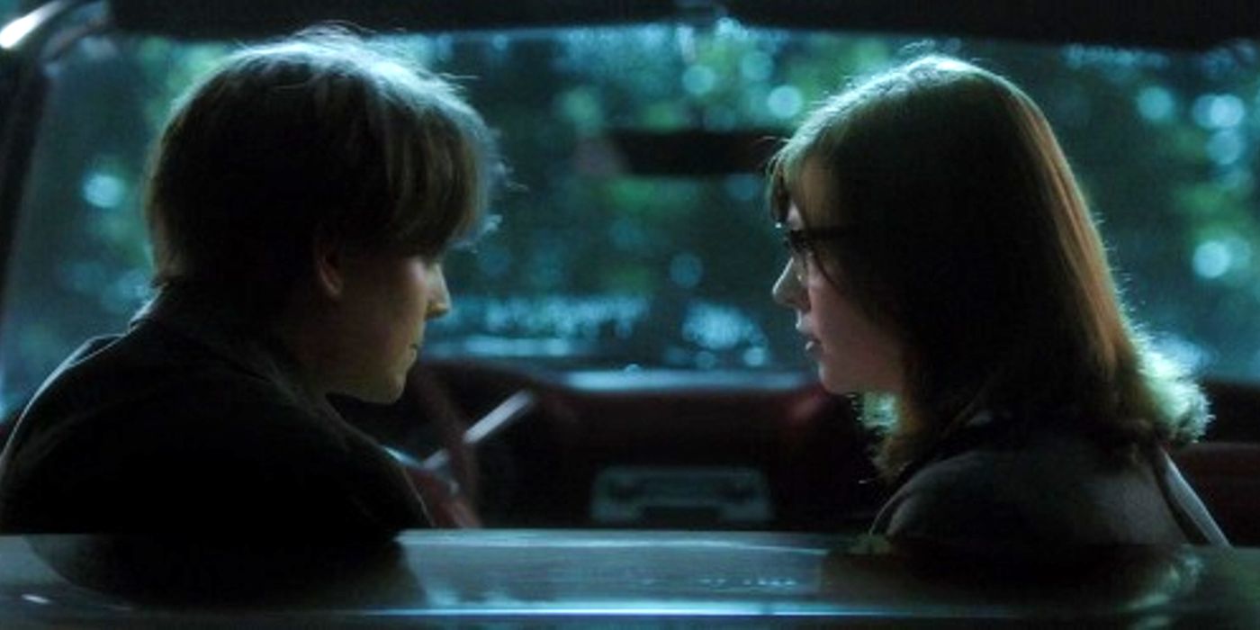 John and Jane (both Sarah Snook) looking at each other in a car in Predestination.