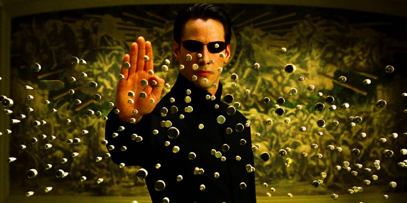 Keanu Reeves as Neo stopping bullets in The Matrix
