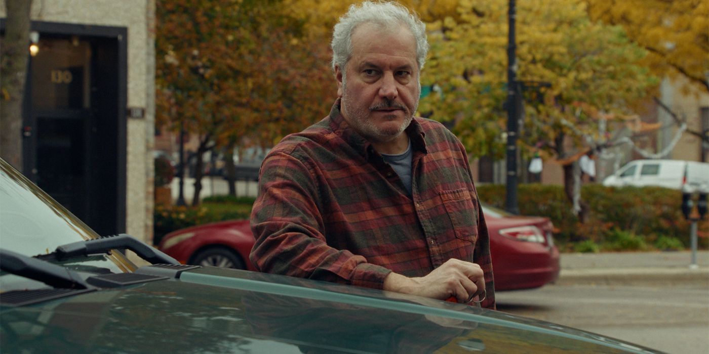 Keith Kupferer as Dan standing by his car in Ghostlight
